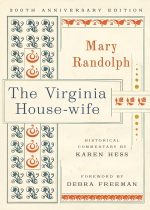 Cream background with blue title and orange author name. Antique graphic patterns create borders for the text.