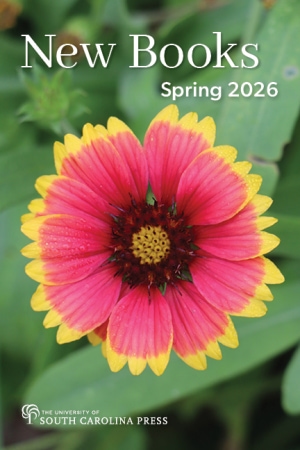 Close-up of flower with red petals and yellow tips.